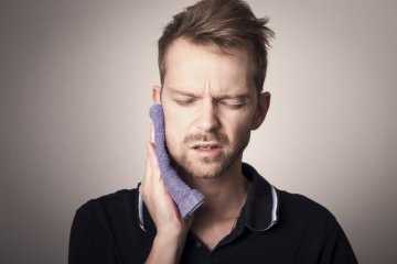 Bolest zubu při skousnutí: příčiny, příznaky a léčba | Návod a rady