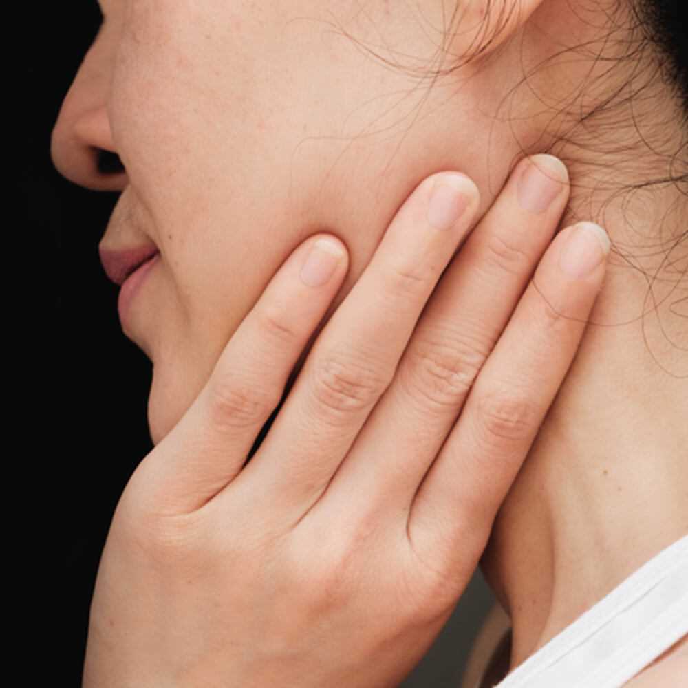 Bolest čelistního kloubu a ucha: příznaky, příčiny a léčba